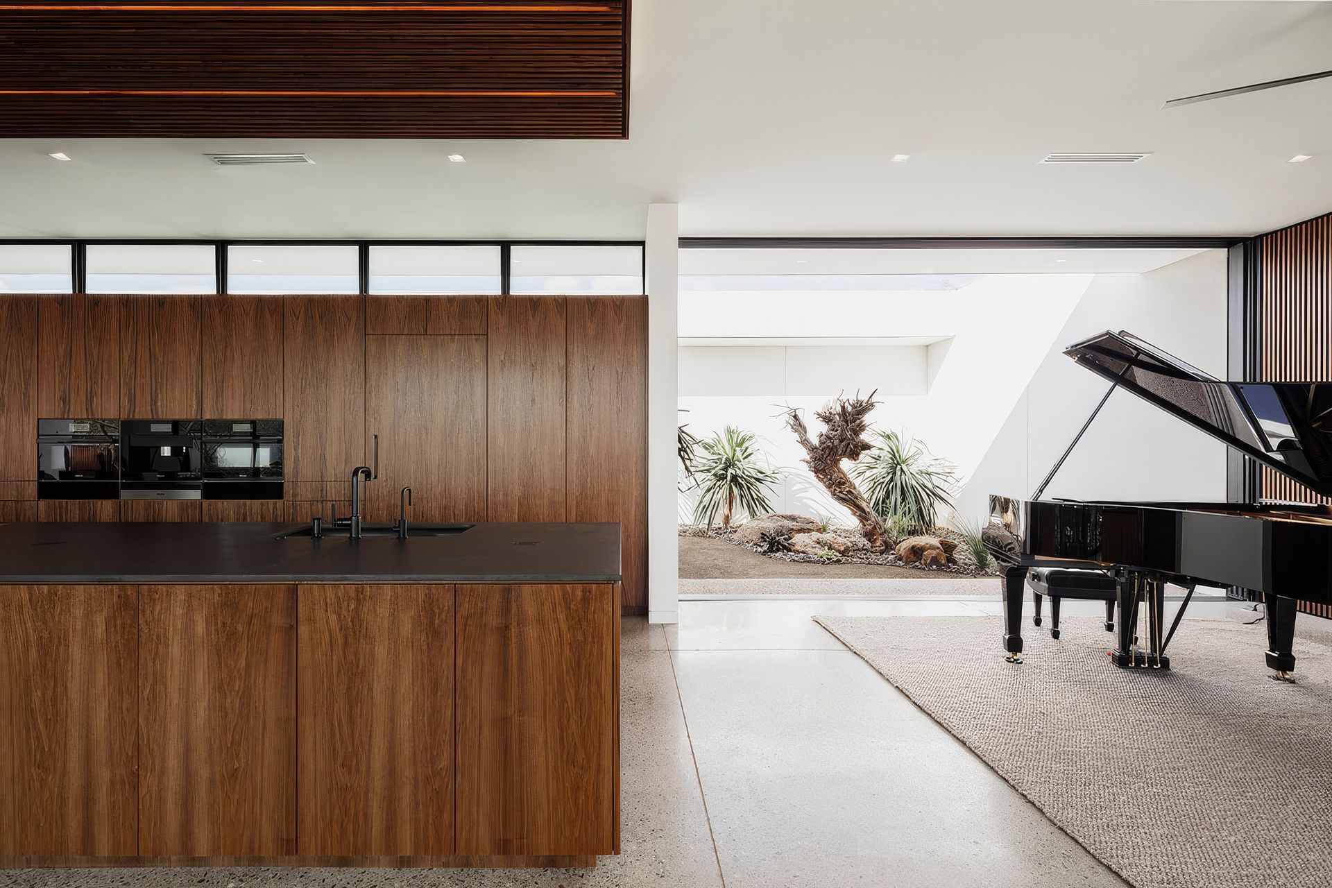 61b97f322b588647e549125akitchen20and20piano20towards20courtyard-upscaled-by-Replicate.jpg