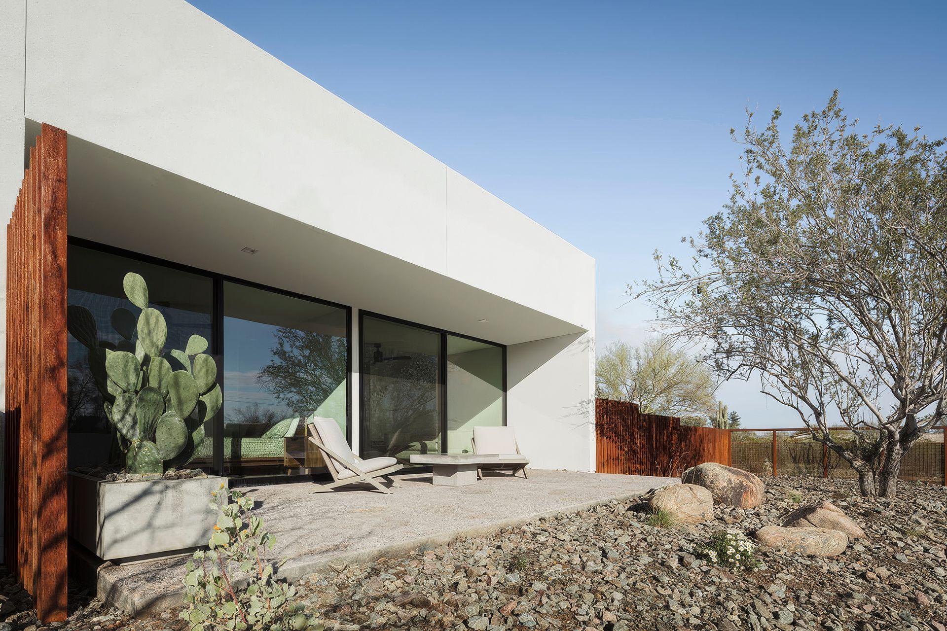 61b97f388eccfa61bea7b02eguest20house20patio-upscaled-by-Replicate.jpg