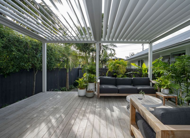 Louvre Roof and Gate Create Oasis of Tranquility