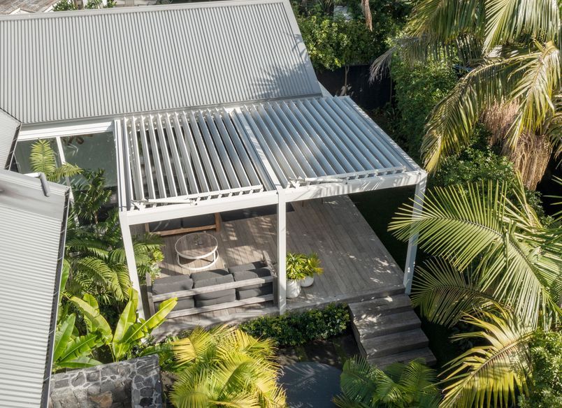 Louvre Roof and Gate Create Oasis of Tranquility