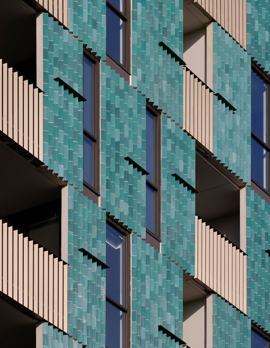 Brick-Inlay-ig-zag-facade-Tan-Tat.jpg