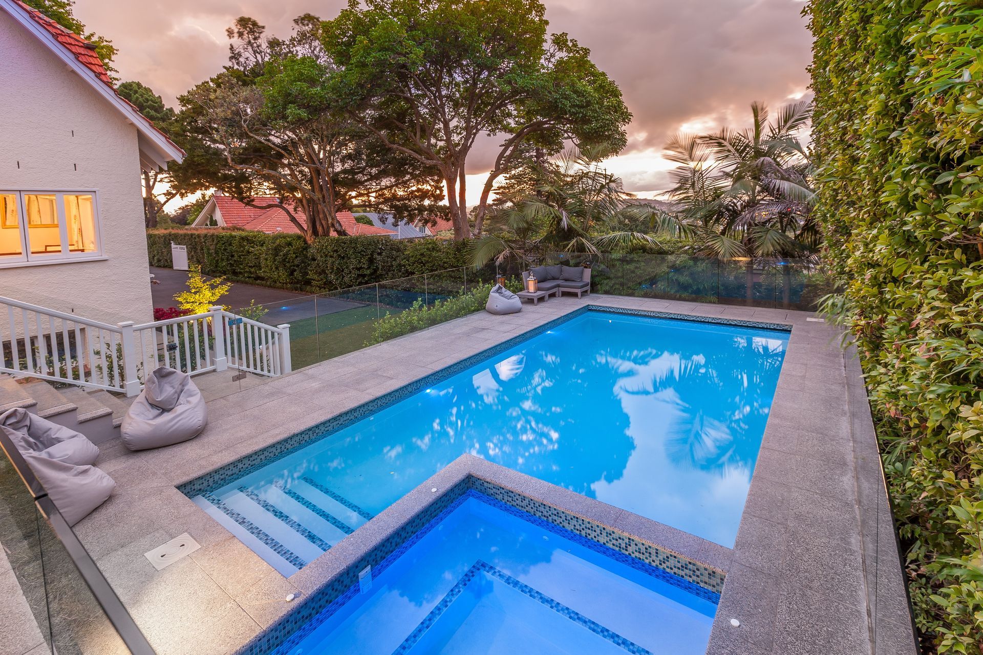 Pool &amp; Spa at Dusk - Hydrazzo Gulfstream Blue from SSL Distributors 
Tiles - Independent Ceramics Crystal Blue Mix