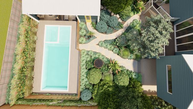 Aerial view of a landscaped residential courtyard featuring a rectangular swimming pool, winding pale paving paths, dense layered planting, timber decking, and dark-clad building wings surrounding the garden.