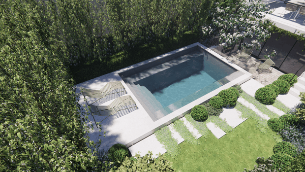 Aerial view of a landscaped residential pool area with a rectangular in-ground swimming pool, pale paved surround, sun loungers, clipped spherical shrubs, stepping-stone paths, and a manicured lawn enclosed by mature greenery.