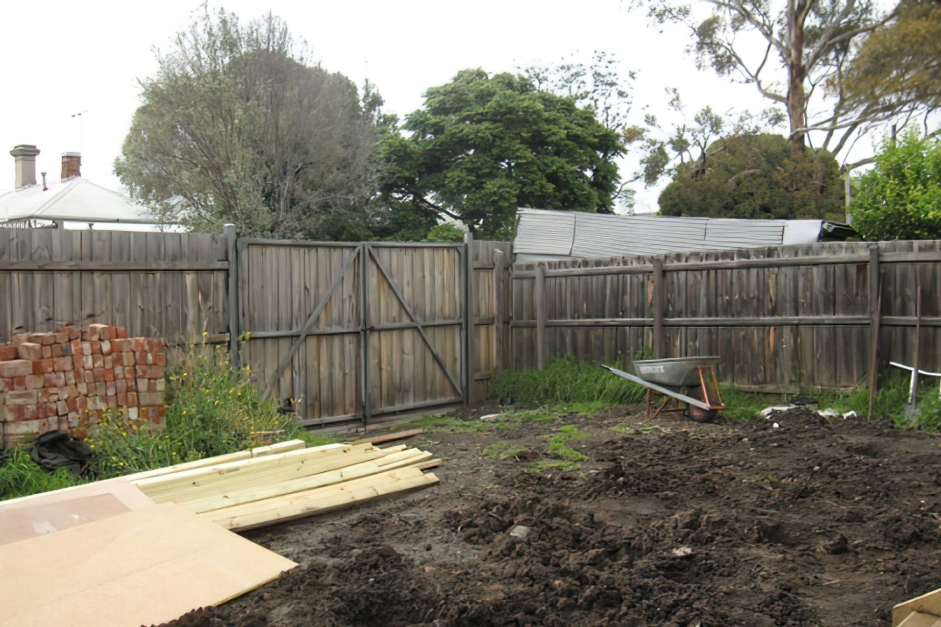 BEFORE the garden design. The backyard is a mess after renovations