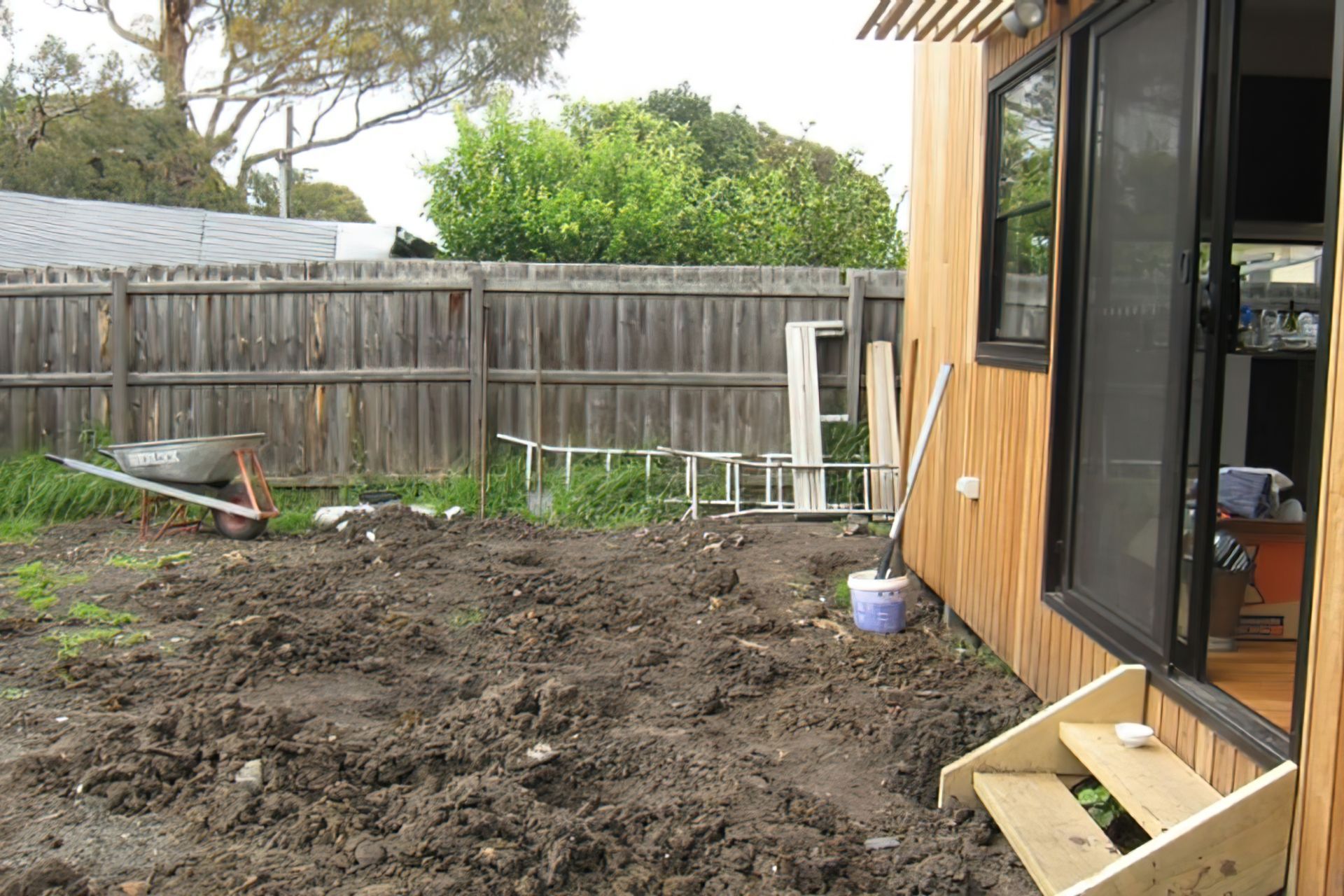 BEFORE the garden design. The backyard is a mess after renovations