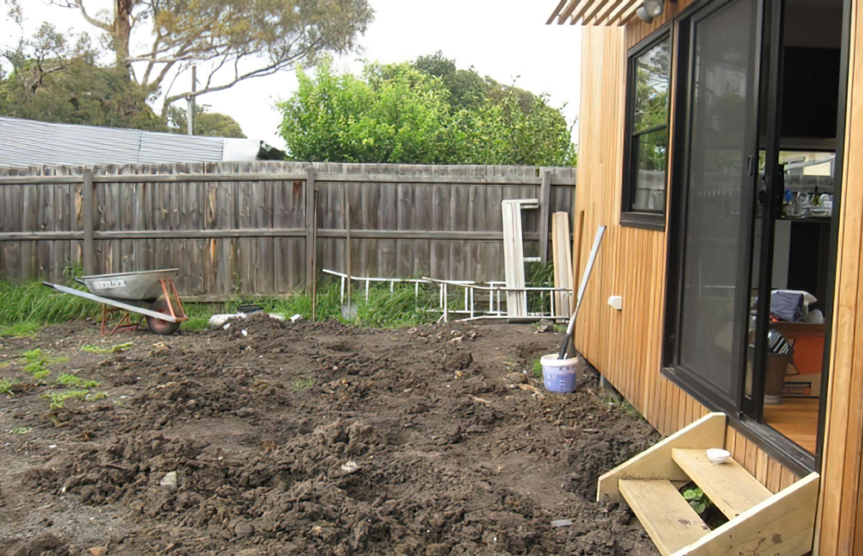 BEFORE the garden design. The backyard is a mess after renovations