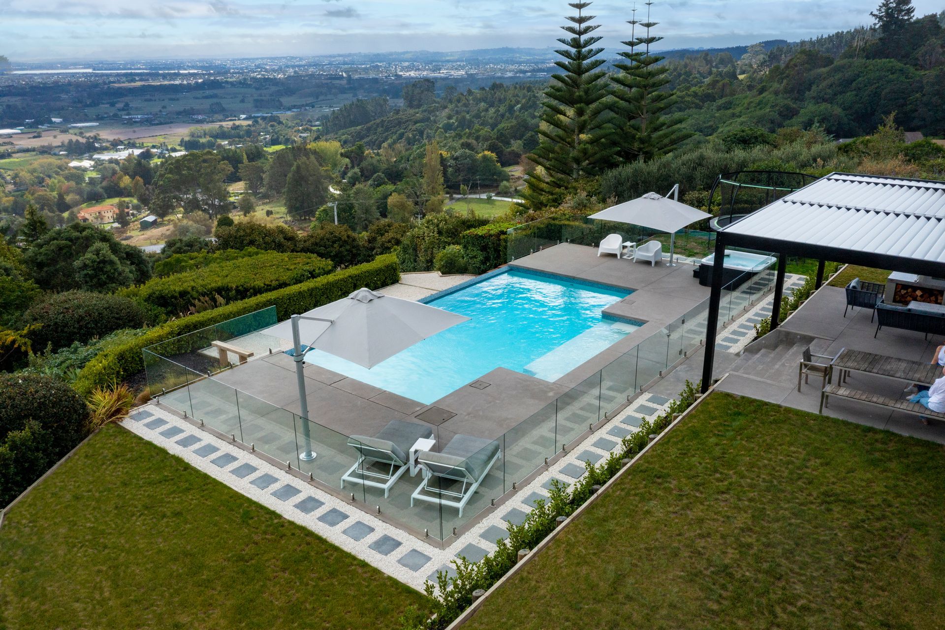 10m x 5m Pool with Step Out Area takes in the compelling views right across Auckland City, the Manukau Harbour and over to the Waitakere Ranges