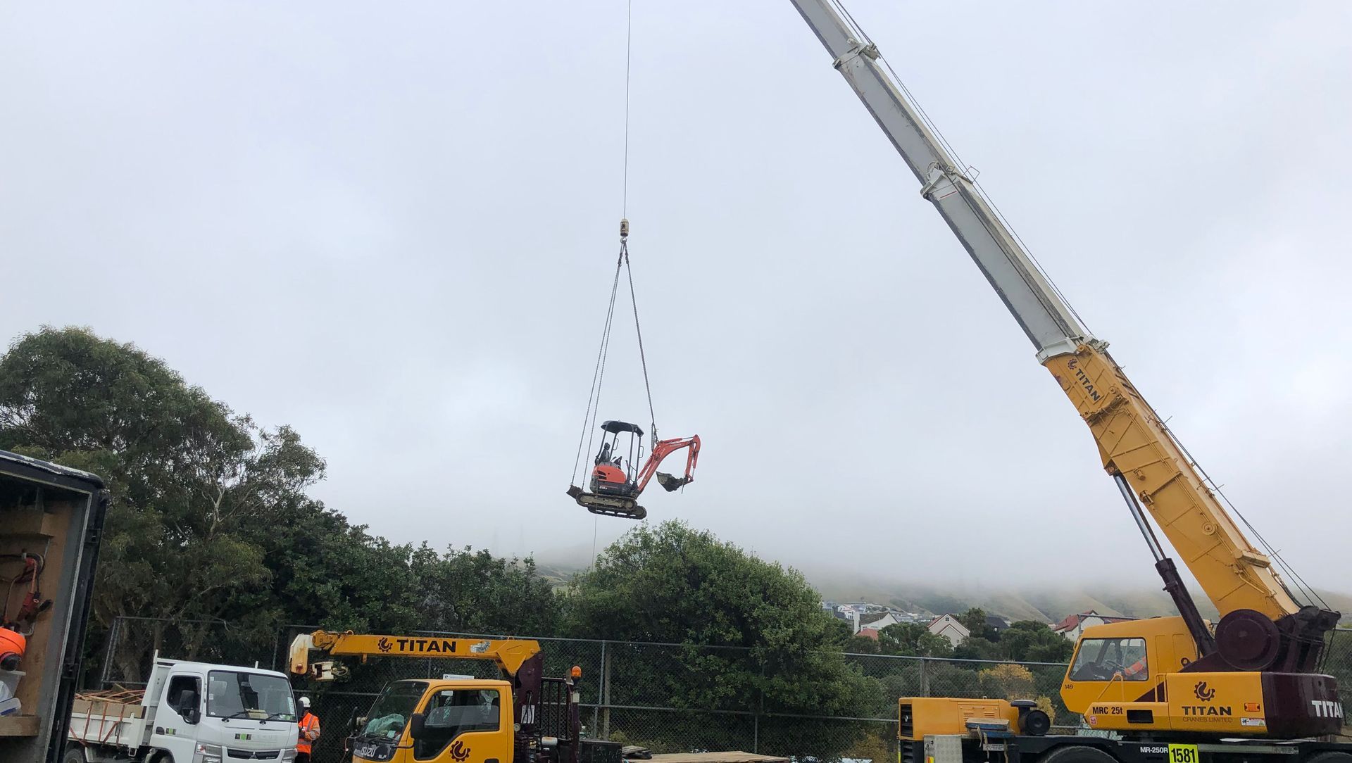 Helicopter - Crane lifts banner