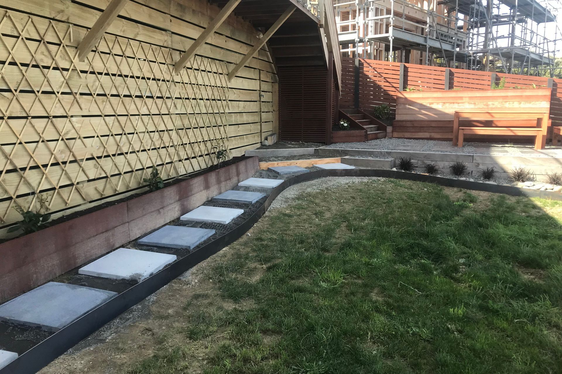 Installation day. All of Straightcurve's weathering steel products come with a protective film to stop it weathering before it reaches the environment in which it will finally lay.