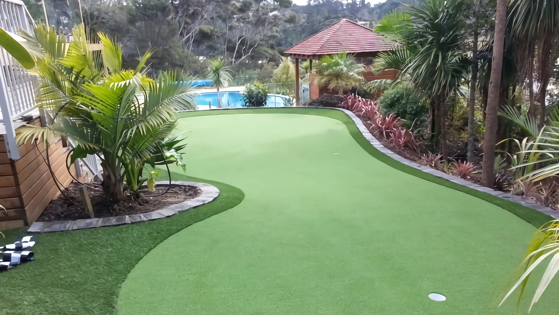 Turn your lawn into your own care-free golf green banner