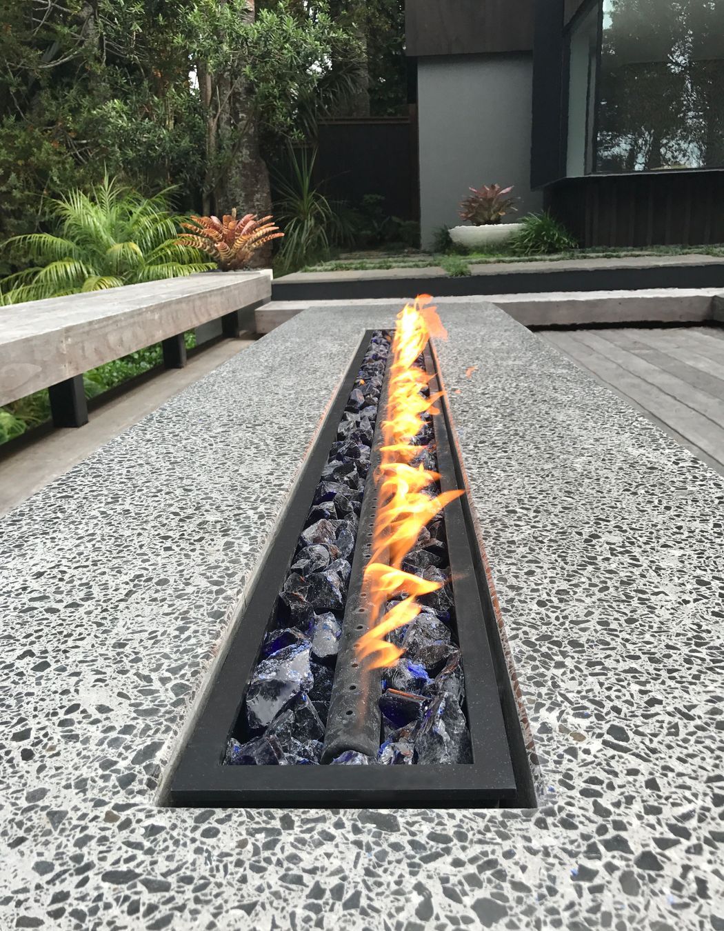 Fire pit table. Designed by lanzscapes