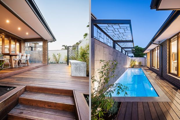 Split view of a contemporary residential outdoor entertaining area and courtyard pool. The left side shows a timber deck with broad steps, covered alfresco dining, recessed ceiling lights, brick walls and outdoor furniture. The right side shows a narrow lap pool bordered by timber decking, dark brick walls, glazed openings and a geometric metal pergola or screen.
