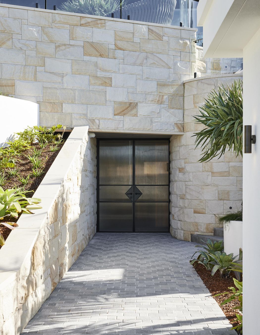 Two-Tone Porphyry Cobblestones | EB Interiors | Innovate Architects | Ben Richardson Building