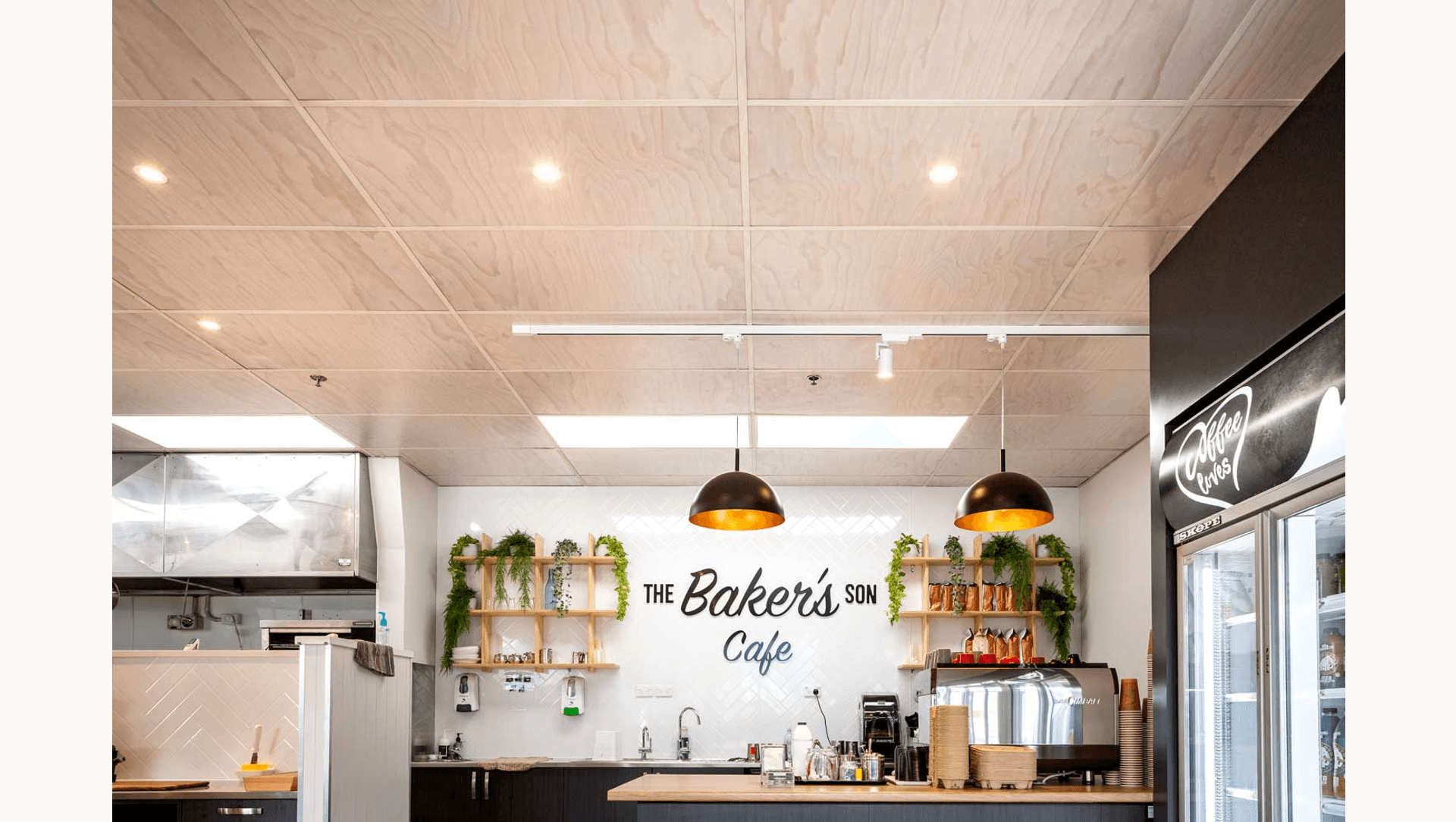 Hygienic ceiling tiles printed with a timber pattern banner