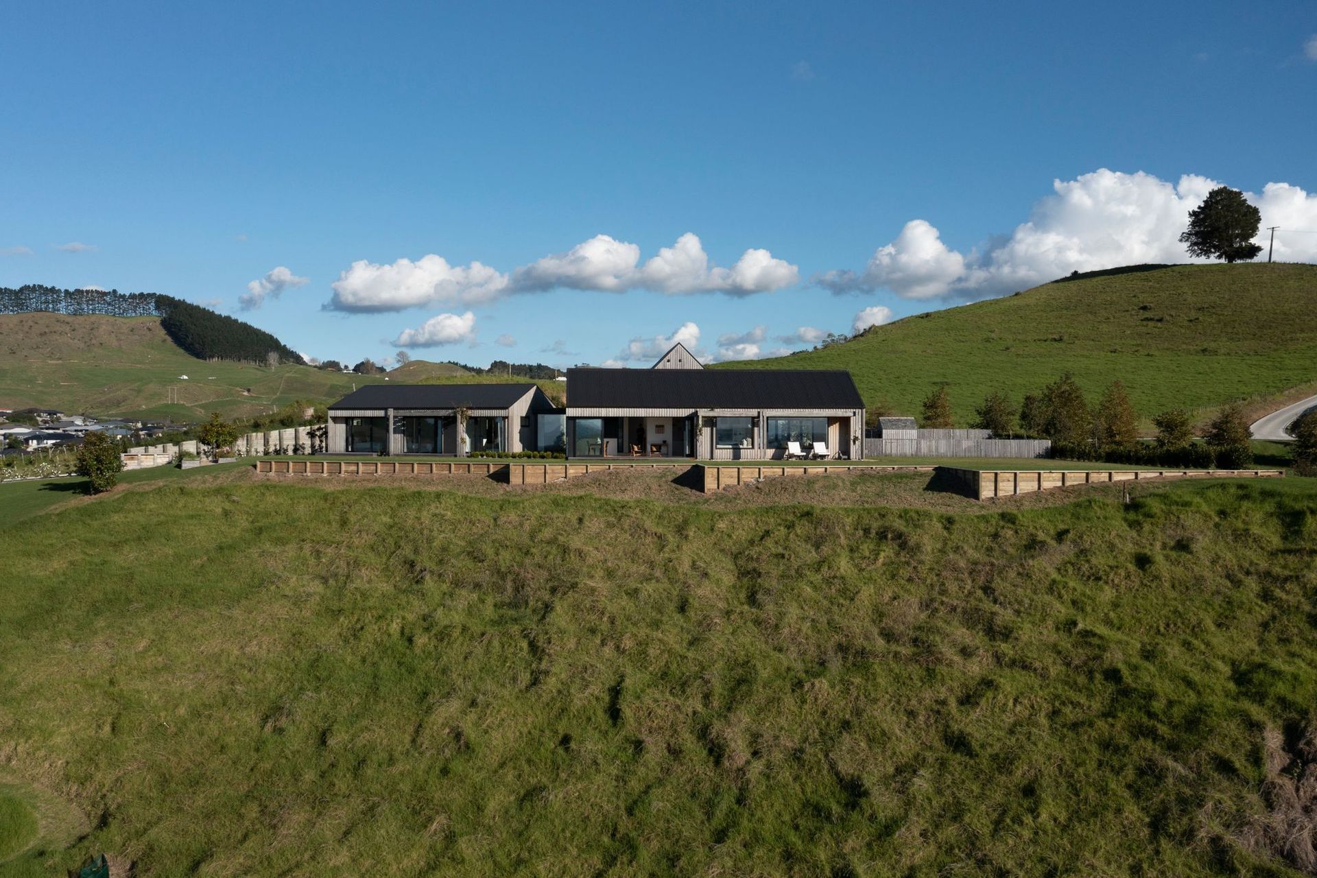 The home sits near the top of the Welcome Bay hills in an enclave of spacious lifestyle sections.