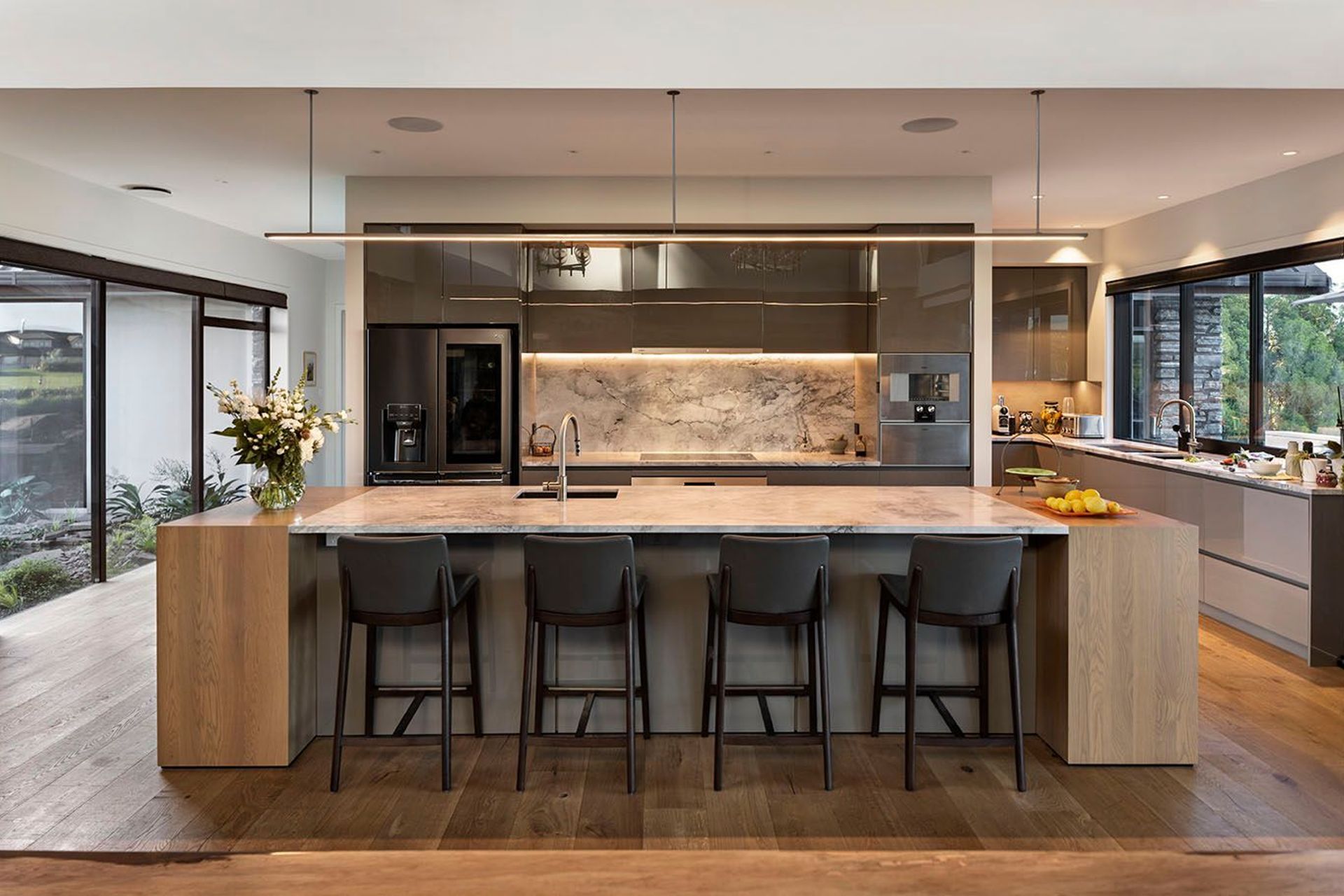 Open kitchen offers social and casual dining in addition to the formal spaces
