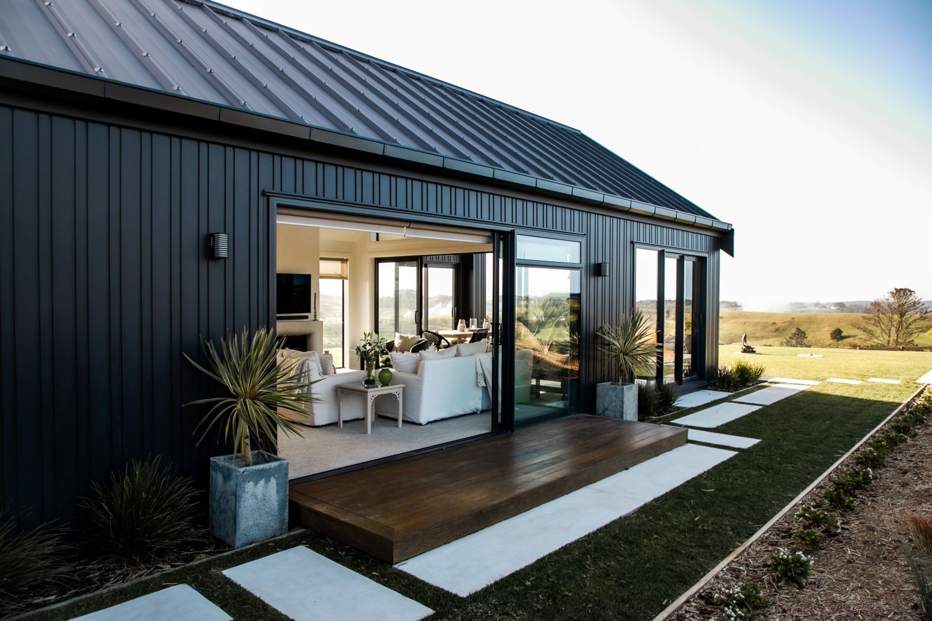 black-nuwall-cladding-te-arai-farmhouse-arcline-architecture-1.jpg