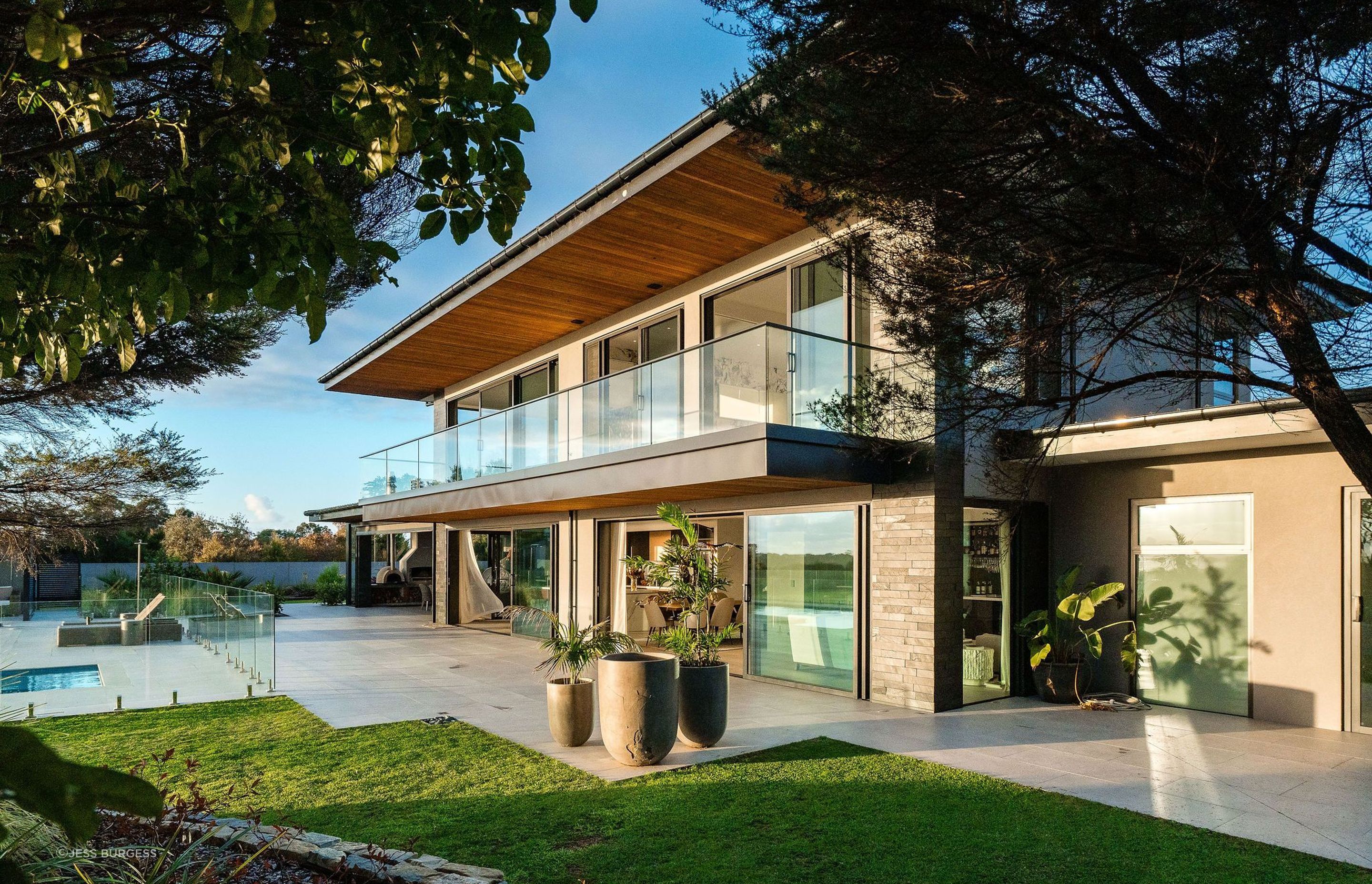 trees-tiling-outdoor-area-eaves-joinery-glass-views-arcline-architecture.jpg