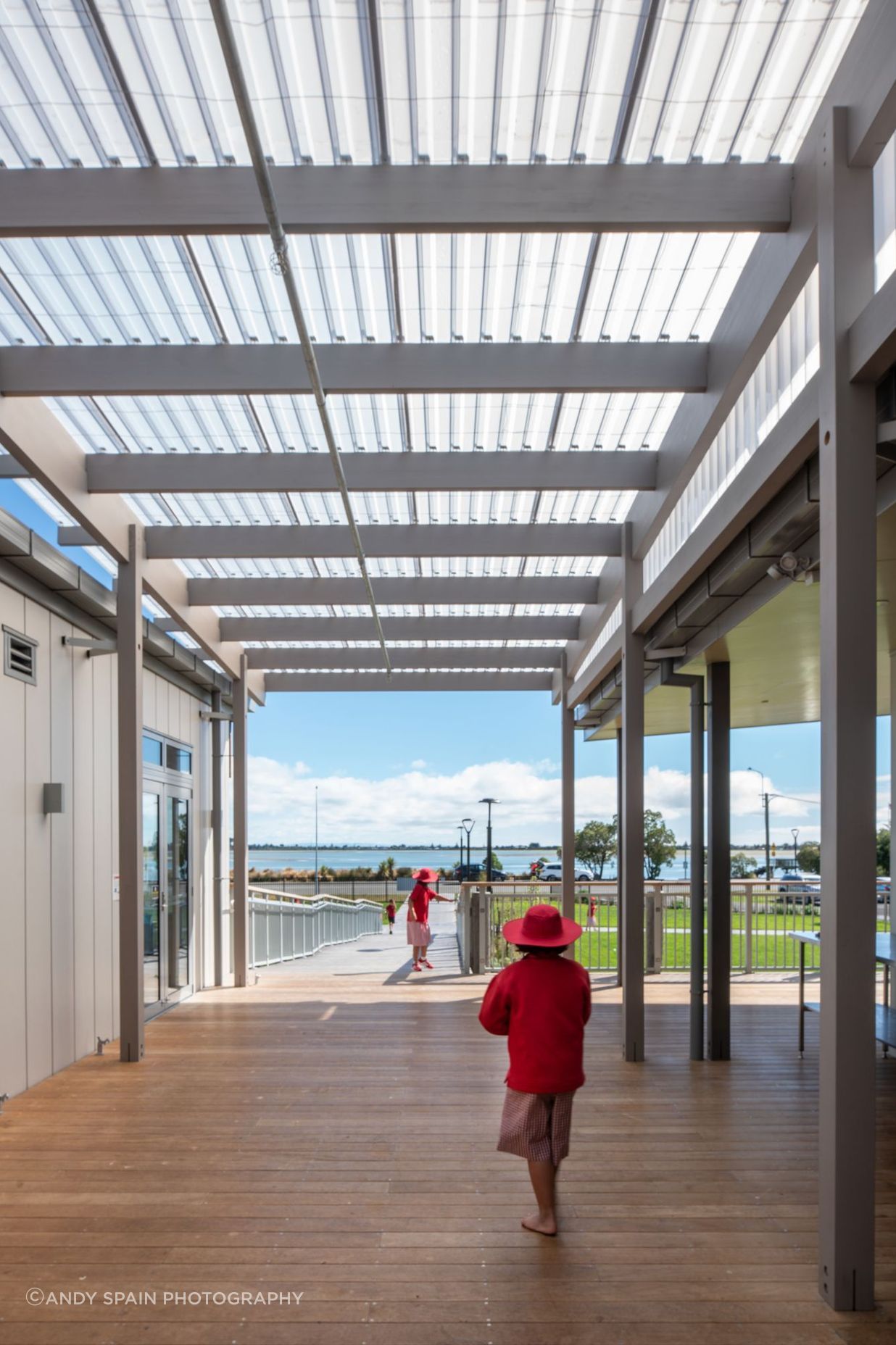 Timber canopies link buildings together, providing shelter and allowing for natural ventilation and open-space corridors.