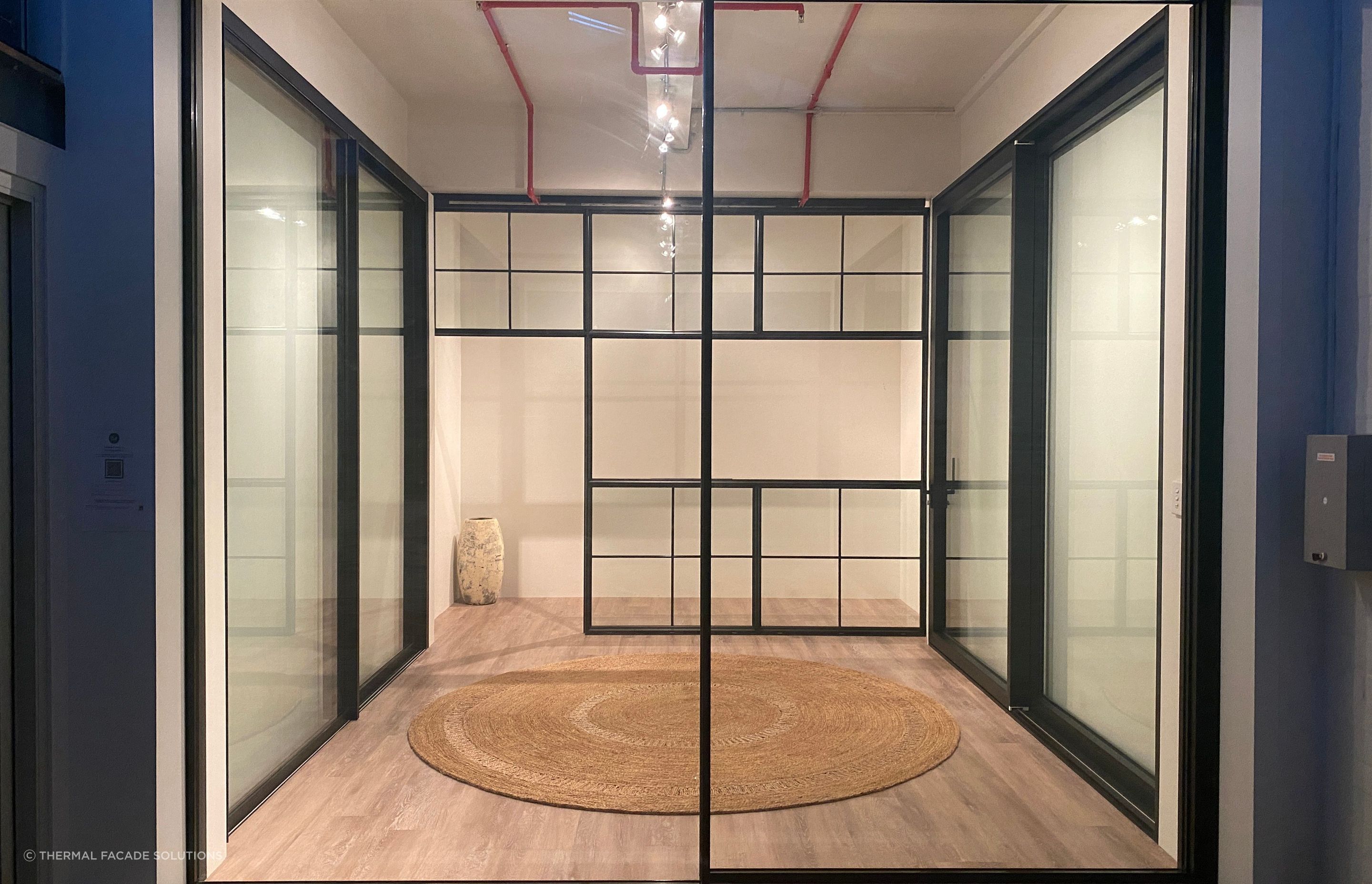 Minimal sliding door with concealed frames