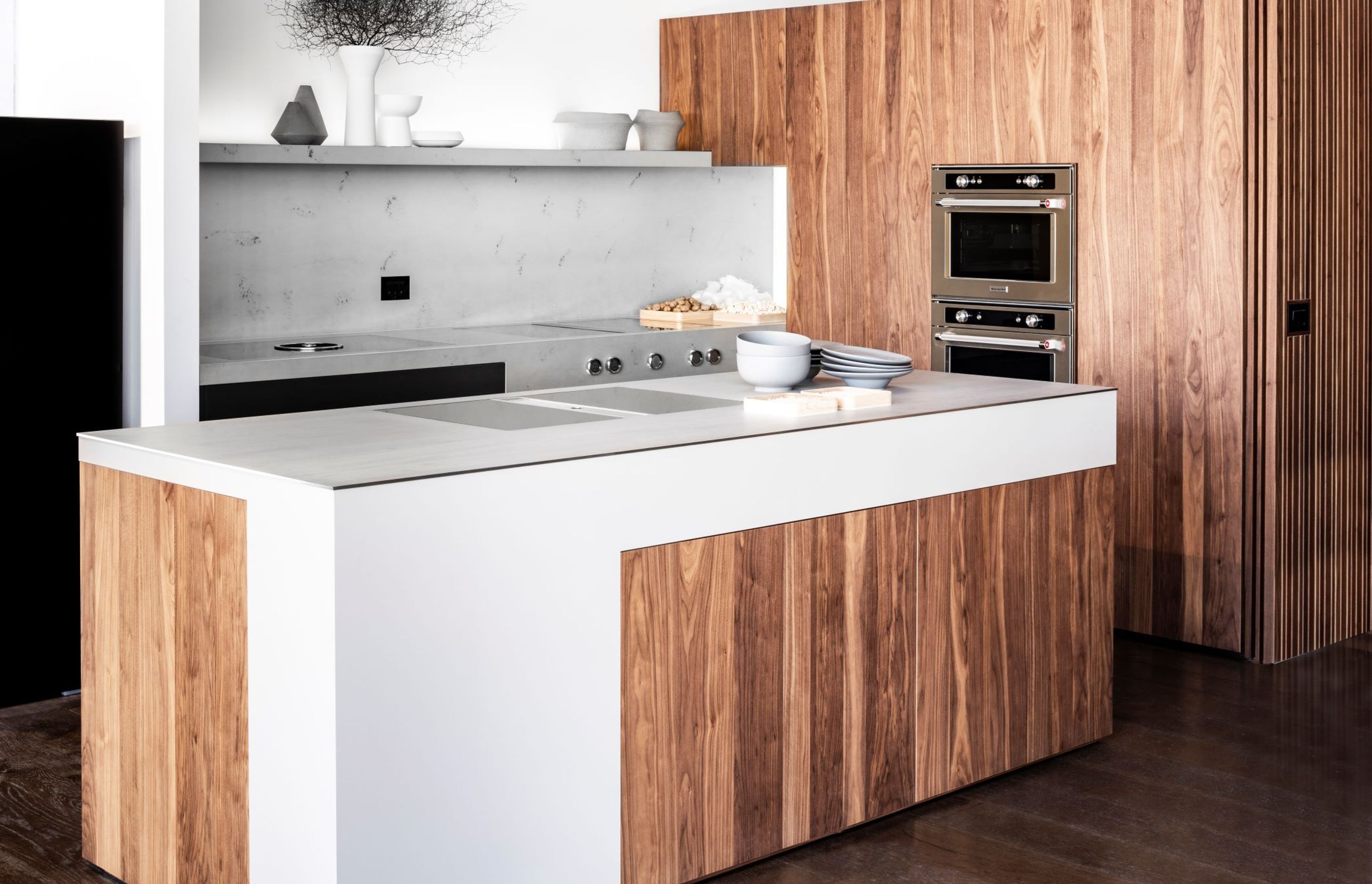 A stunning minimalist design was created by Living Design to enhance the BORA cooktops which have integrated extractors.