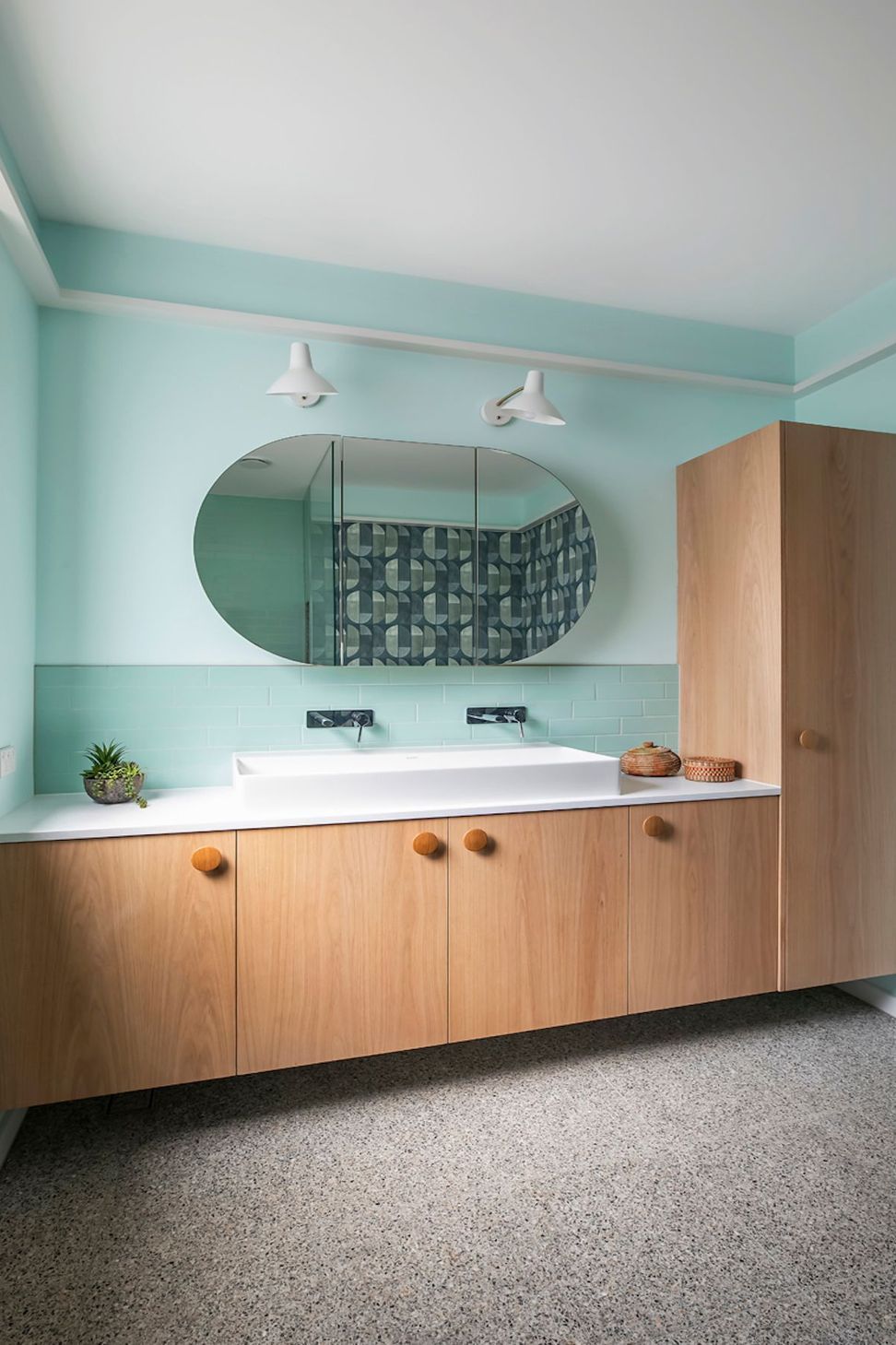 08-portrait-envirotecture-curvaceous-passivhaus-nsw-blue-bathroom.jpg