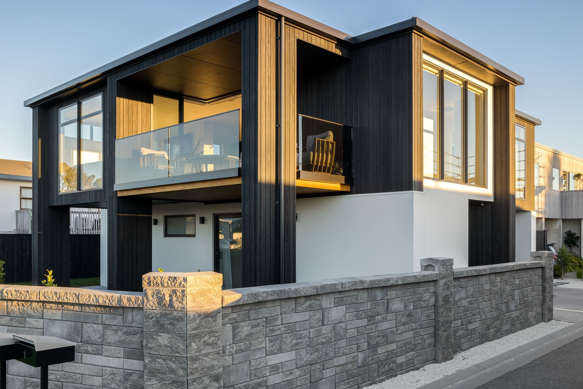 The two-storey home is part of a new coastal development by Flowerday Homes in Bay of Plenty.