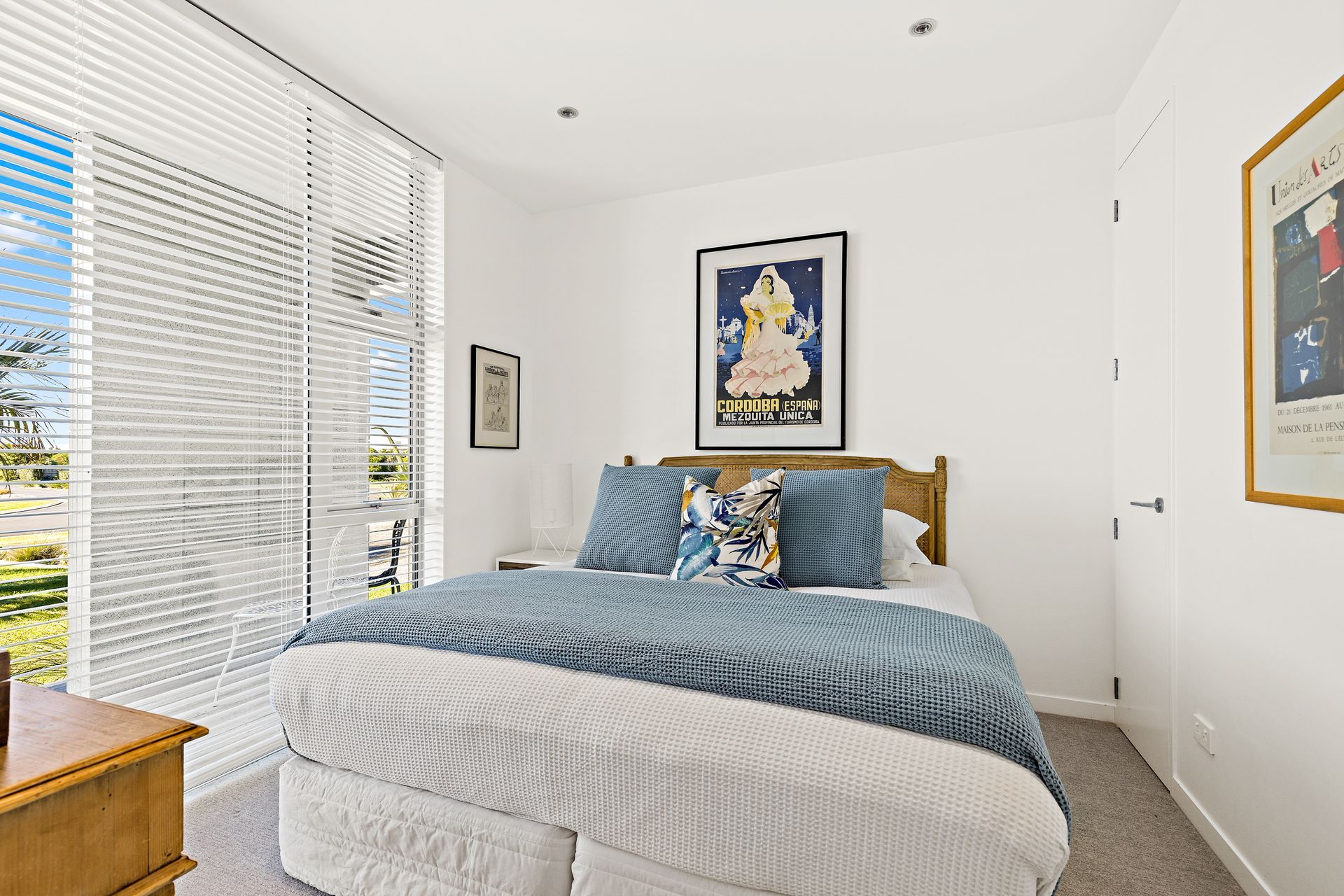 A flexible downstairs area may used for a gallery, office or bedroom. Photo Credit: Amy Jenkins/Glasshouse Photography