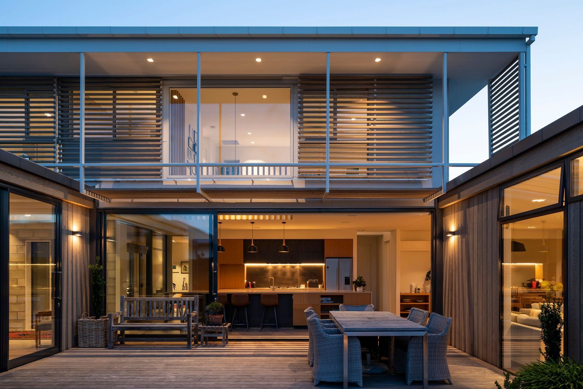 The main bedroom and majority of the living areas including a study and a media room are located downstairs, while a further two bedrooms, family bathroom and additional living room complete the upstairs level.