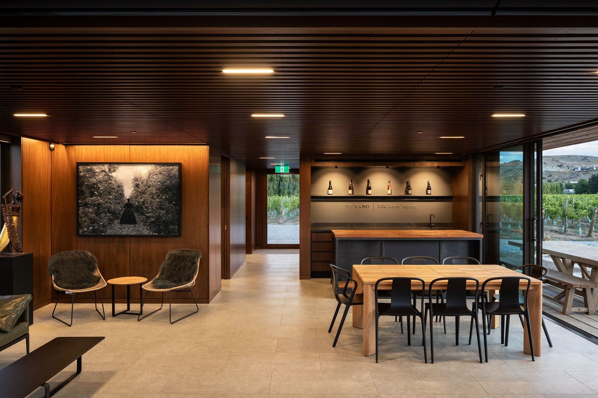 “The building scale is particularly interesting,” says Hamish. “It needed to work with just a handful of people, as well as for large groups and events.” A second container hidden under the structure serves as a wine storage facility.