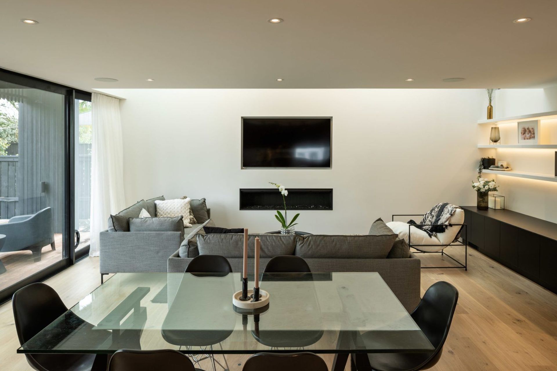 The living spaces feature timber floors as a nod to the character of the original bungalow.