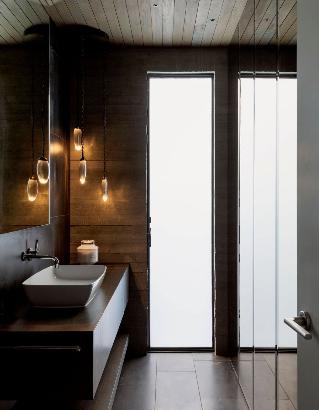 The powder room on the main level is a statement in simplicity.