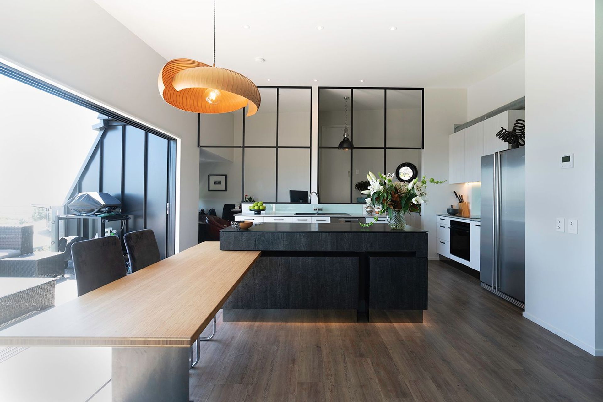 Bespoke designed by Peter Dunbar for a pivoting dining room table beautifully crafted by local Christchurch Kitchen manufactures - Tower Kitchen.