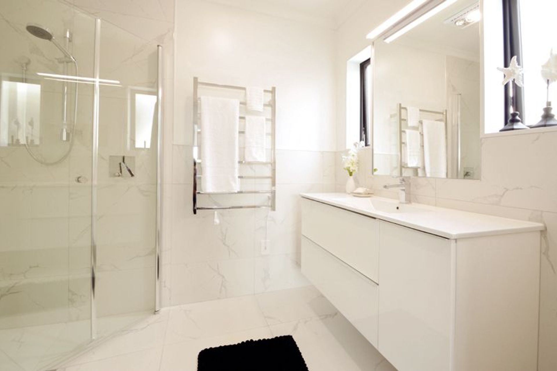 Master Ensuite - Beautiful glamourous master bathroom complete with space saving tiled shower