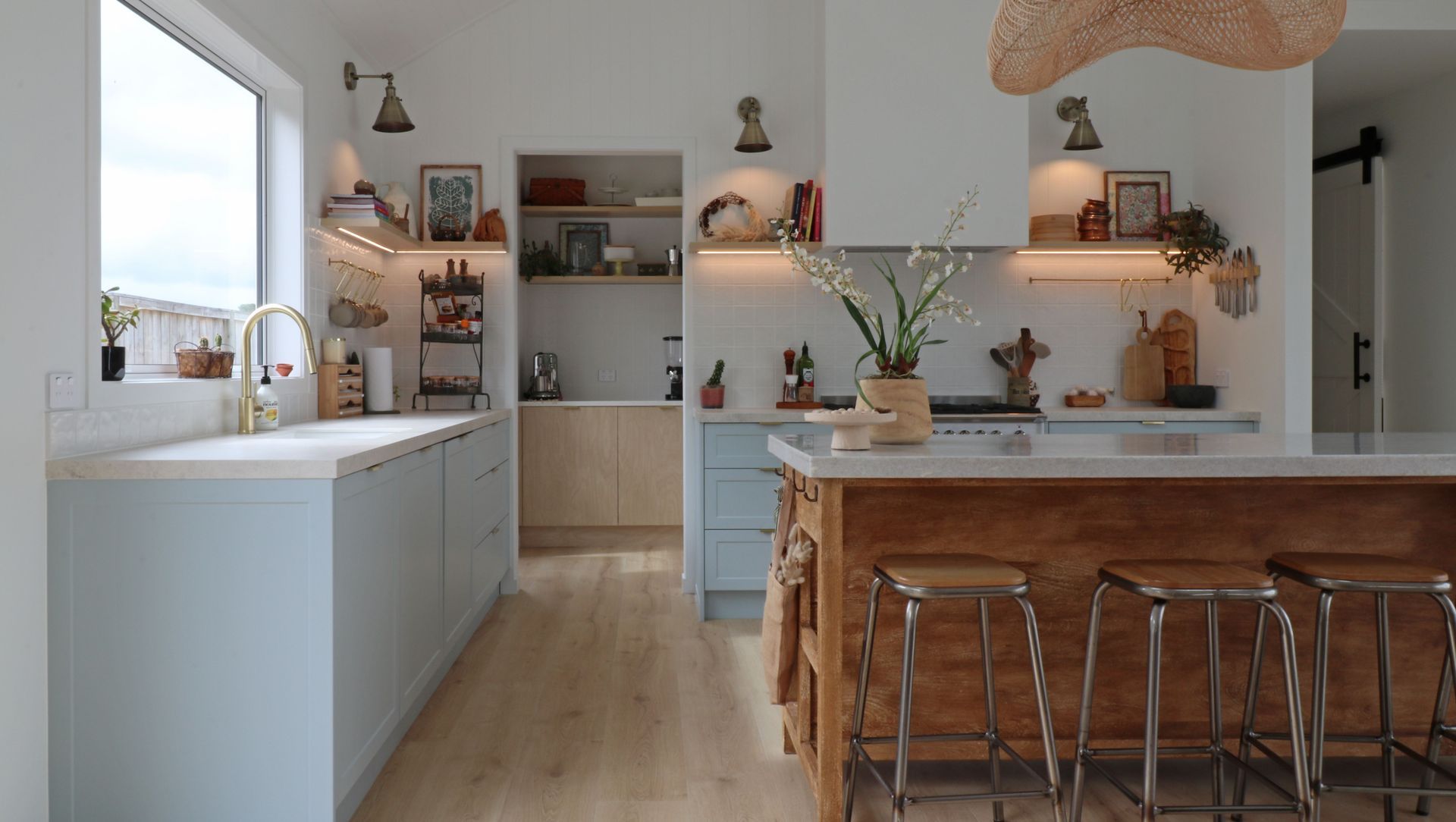Kitchen in Blues with a French Country Island banner