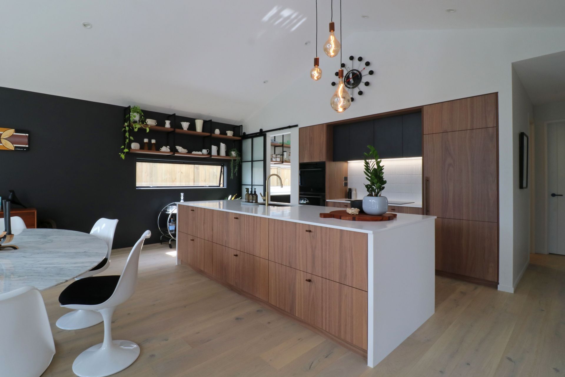 Walnut Veneer with Dark Cabinetry