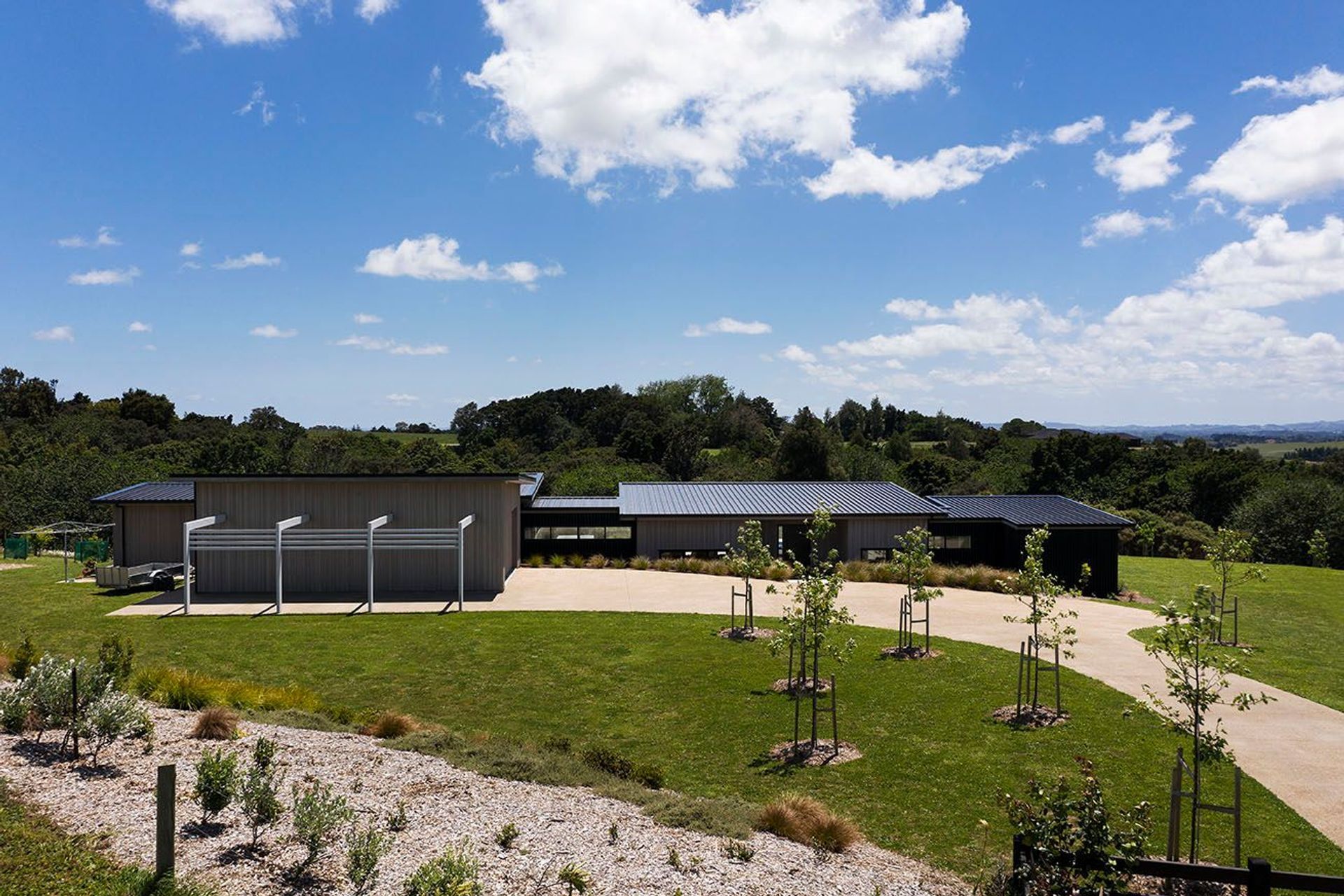 Clean addition to the landscape as this home sprawls across it's living spaces