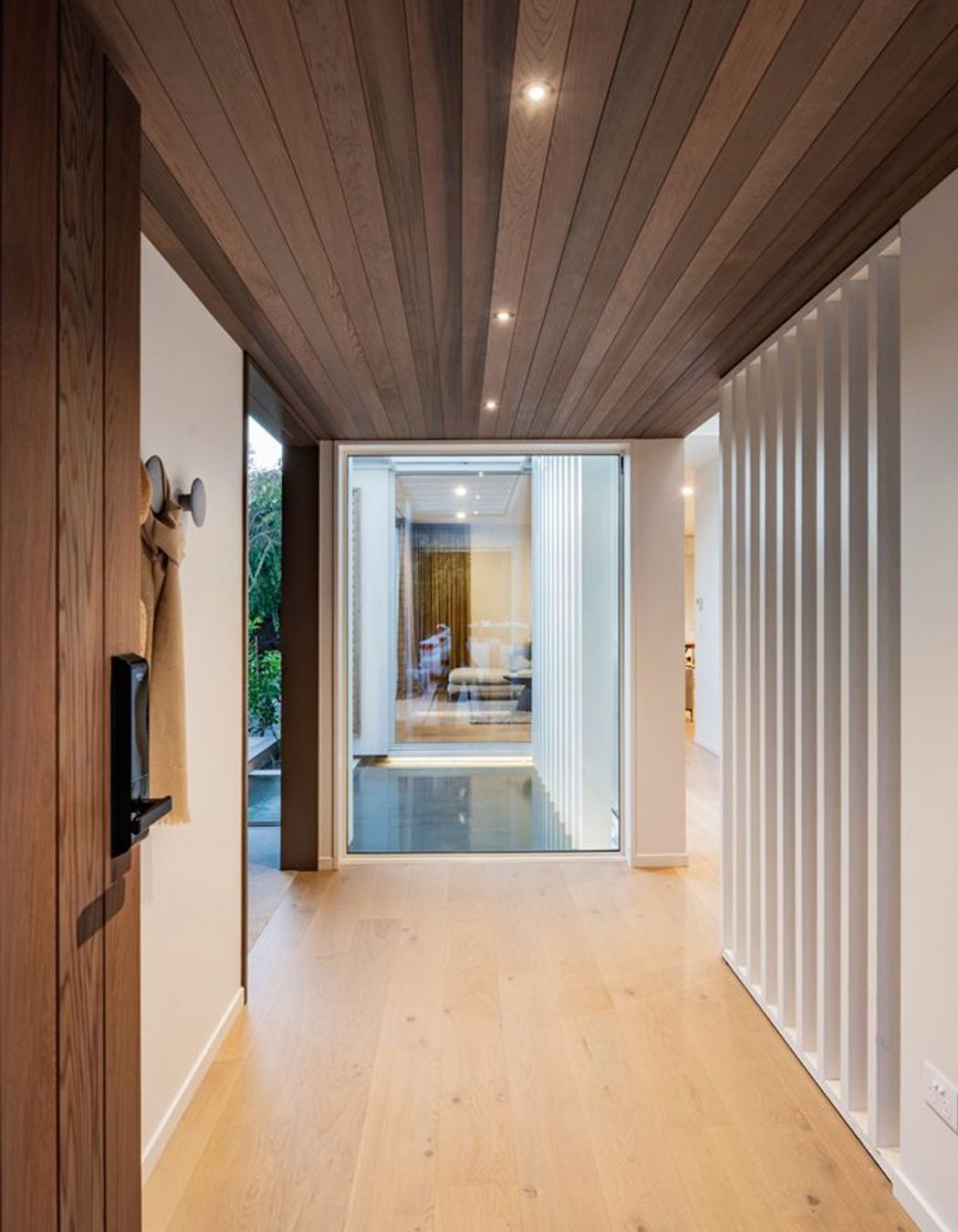 The pond can be seen on entry into the home.