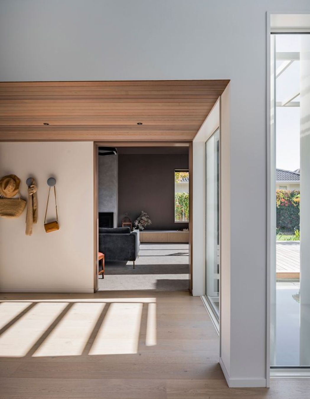 Cedar on the ceiling in the entrance offers a warm welcome.