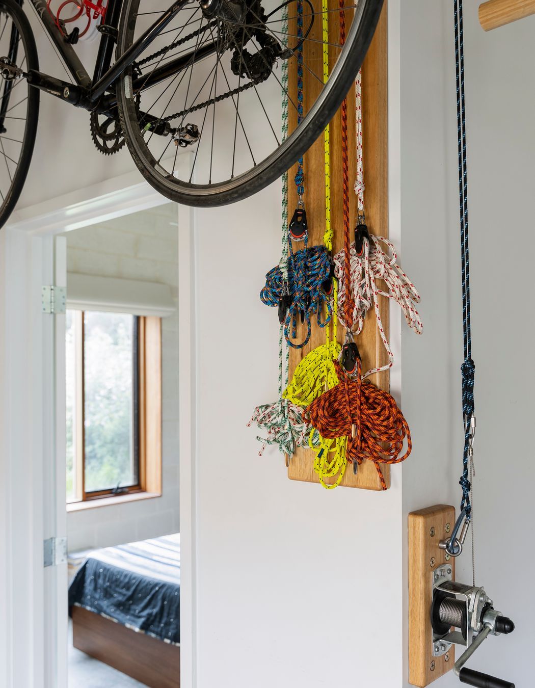 Ropes and winches used in the bike storage system