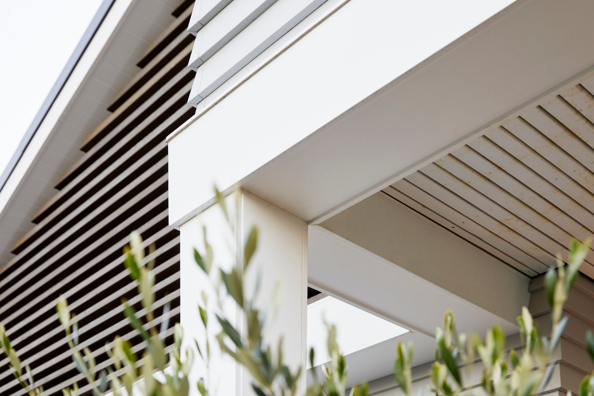 The exterior is classic weatherboard with feature cedar finns. The eaves feature battens aligned in an exacting manner right down to the nail points. details count! 