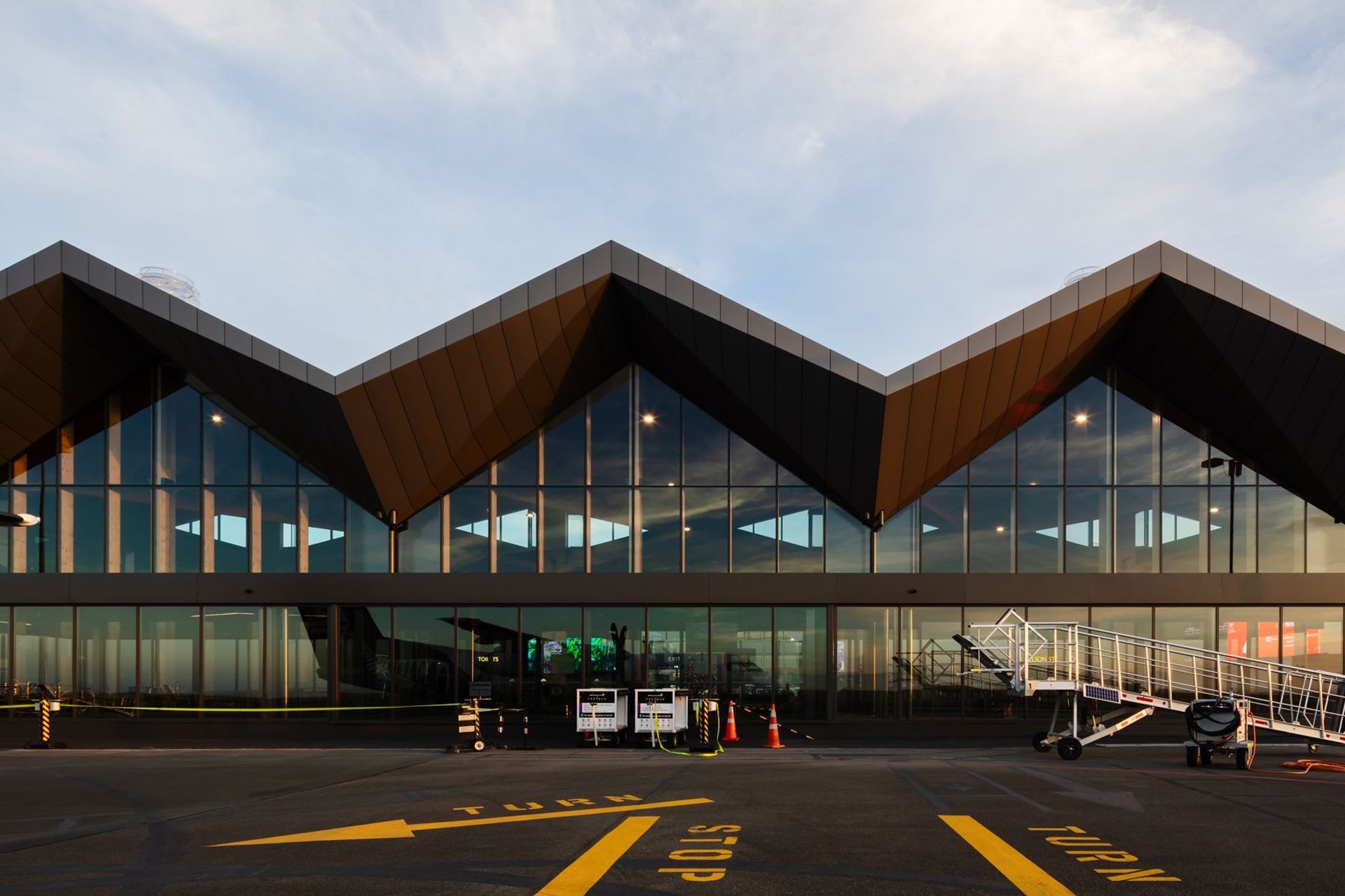 The diagonal forms reference the mountain range panorama as seen from Tasman Bay.