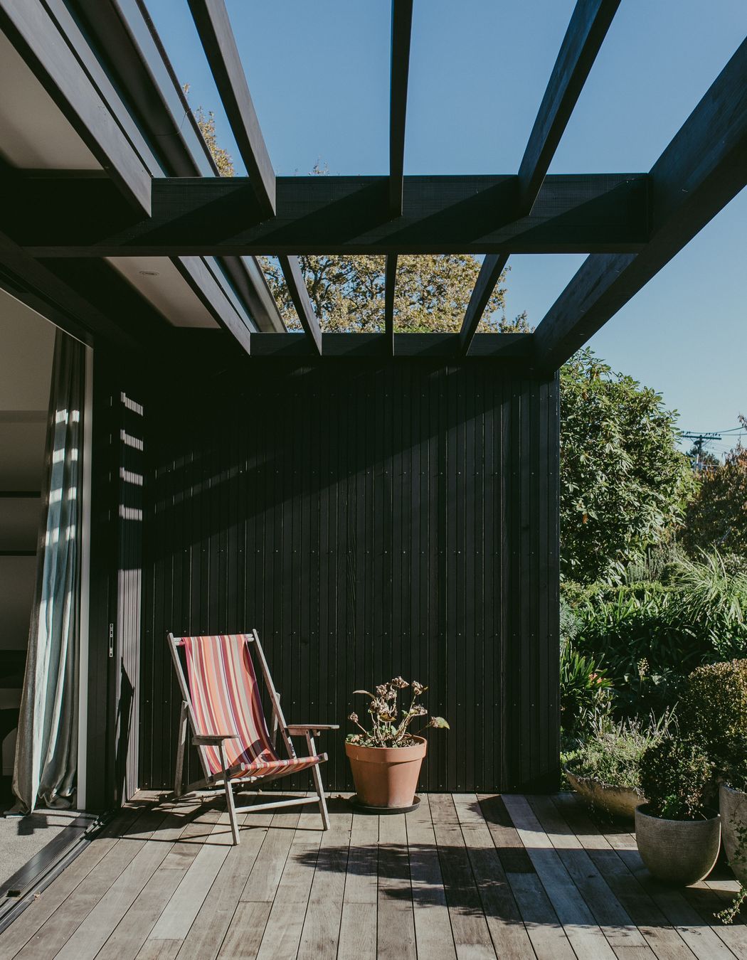The residents can enjoy sitting out on the sun-drenched decks around the home.