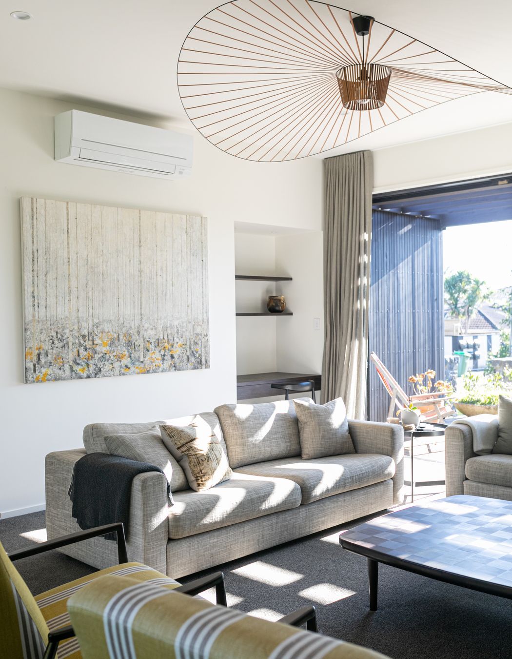 A separate sitting area includes a built-in study nook.