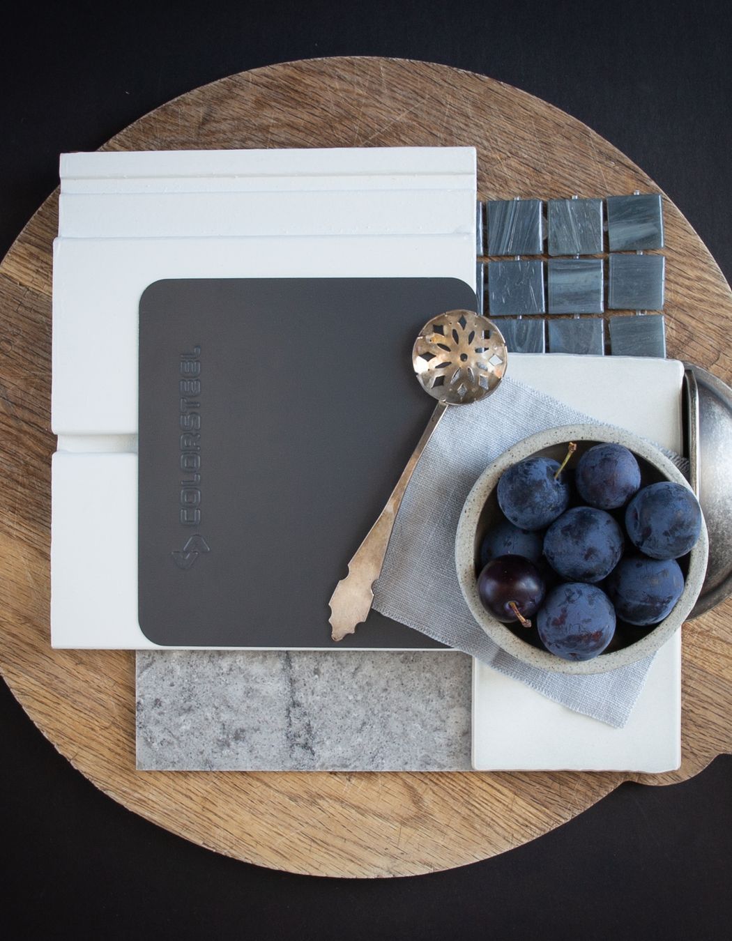 Colour: Grey Friars is a much loved roofing colour with a hint of blue. This palette is designed with a cottage in mind, with the weathered oak kitchen table at the heart of the house, blue tiles, a cool grey benchtop to make pastry, and a white weatherboard exterior. A home where the patina of daily life adds to its character.