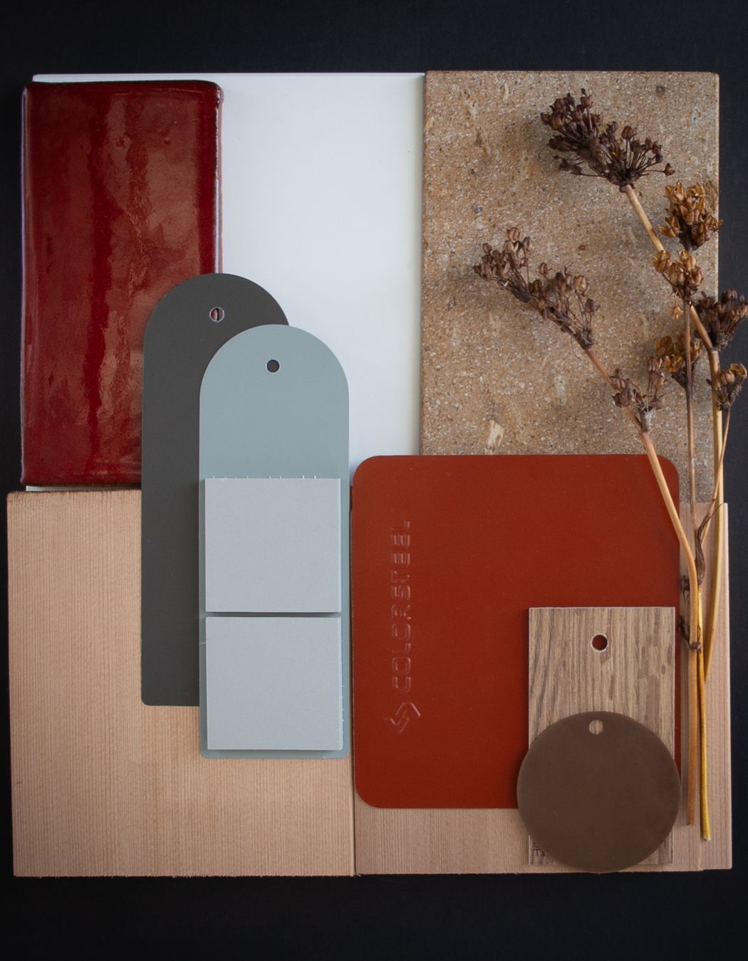 Colour: Pioneer Red is a bold warm red, it can be used many ways: as accents, for the roof, or for the entire house. In this option we designed a house where the strength of the colour feels right at home when paired with the warm tones of NZ Hinuera stone, cedar, NZ handmade tiles and set against autumn foliage.