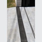 Heel guard grate drain custom architectural on Sydney Driveway made by Alumac
