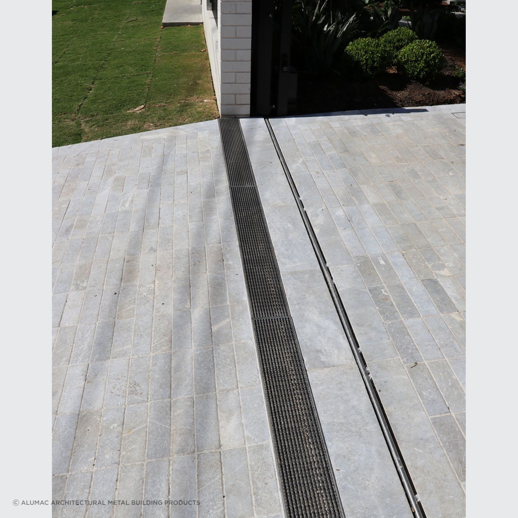 Heel guard grate drain custom architectural on Sydney Driveway