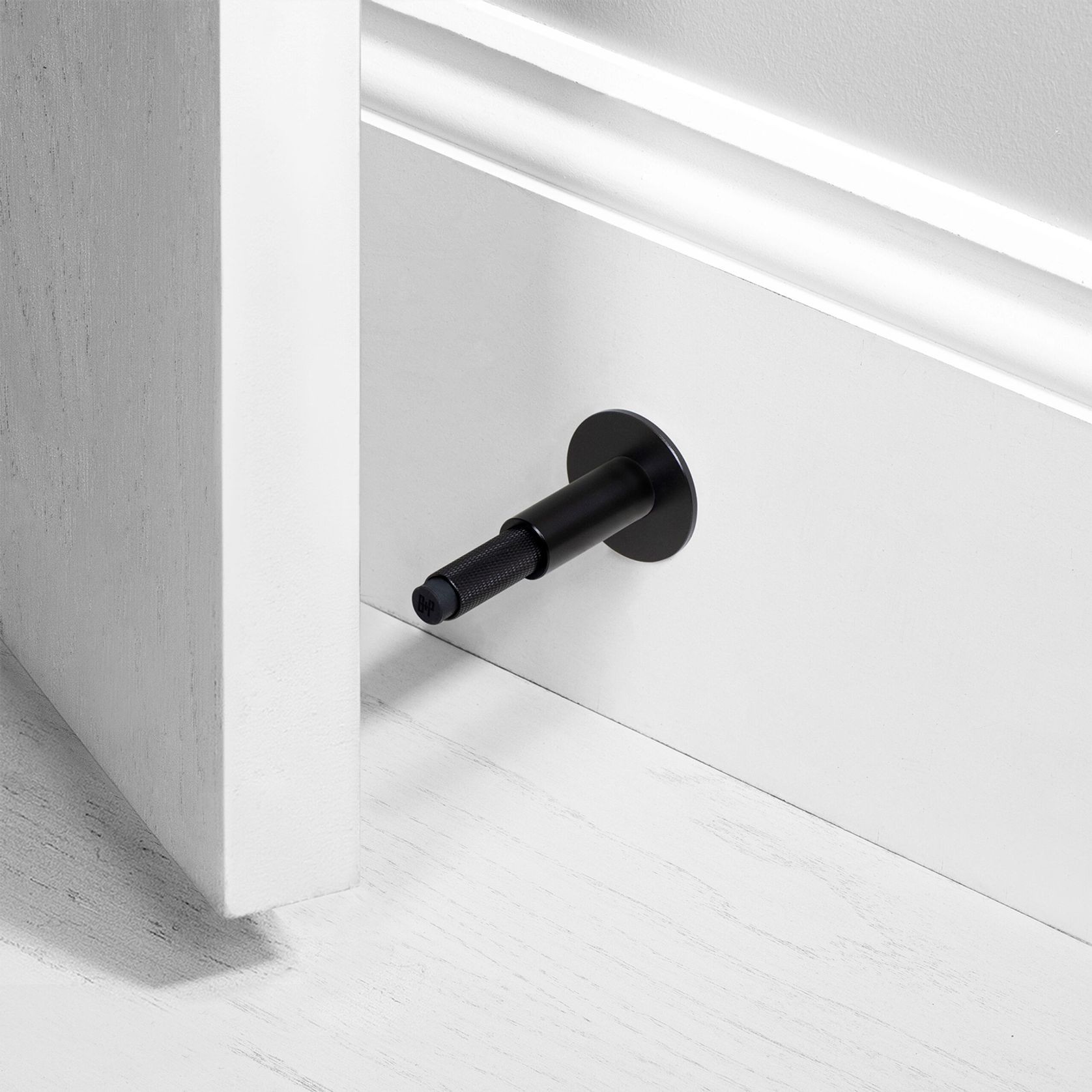 Buster and Punch Door Stop Wall Mounted 96mm gallery detail image